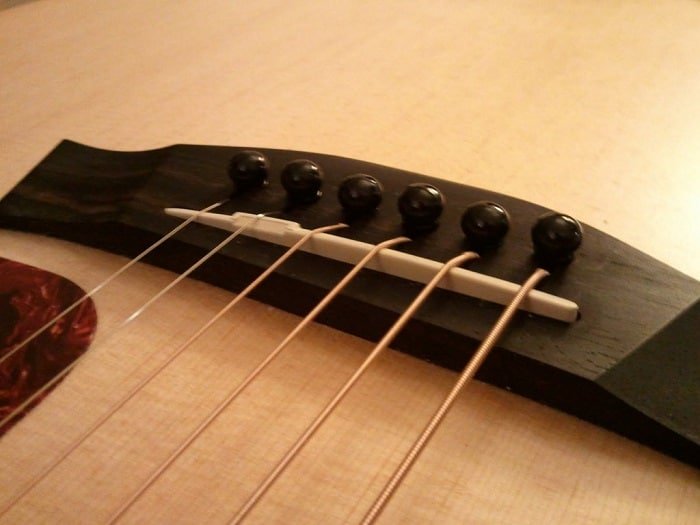 types of acoustic guitar bridges