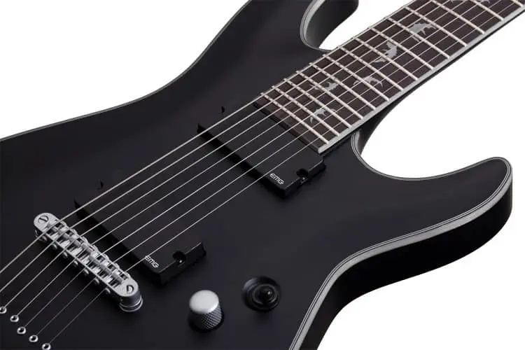 features a This guitar jacked up Super Strat shape that is accented by an arched top design